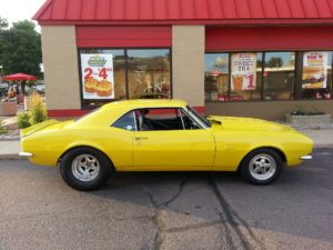 Yellow classic Chevrolet car.