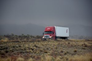 What Is Moly Grease? 9 Semi truck driving.