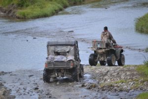 Synthetic Marine Wheel Bearing Grease 7 ATV trailer going through water.
