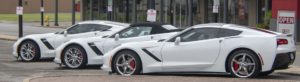 White Corvette cars.