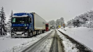 Mercedes truck in snow.