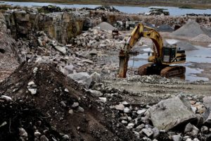 Quarry excavator drill.