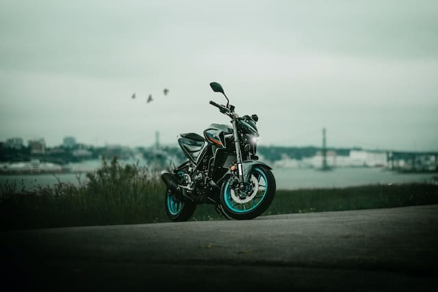Featured image for "The History of Yamaha Motorcycles" blog post. Black Yamaha motorbike.