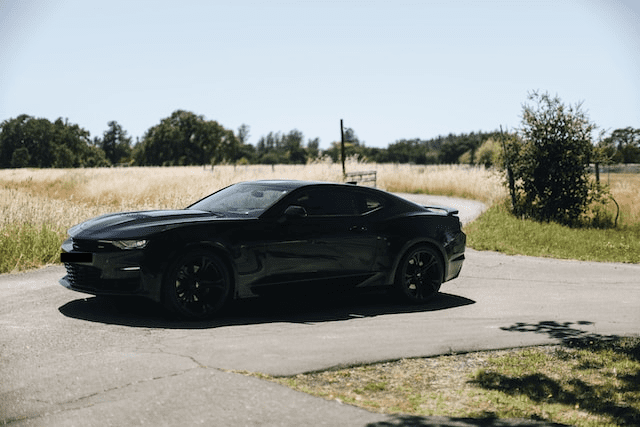Featured image for "2019 Camaro SS Oil Type" blog post. Black Camaro SS.