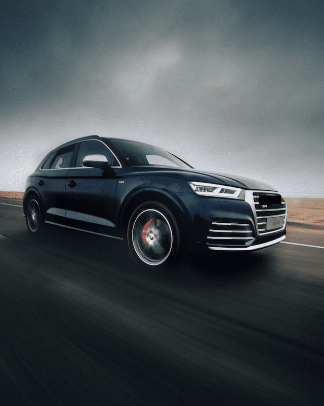 Featured image for "2019 Audi SQ5 Oil Type" blog post. Audi SQ5 car on the road.