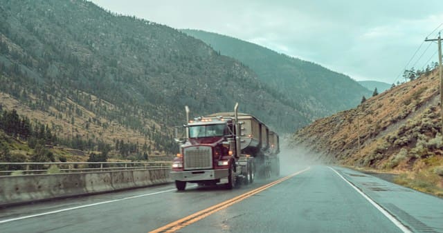 Featured image for "How Synthetic Oils Extend the Lifespan of Your 2015 Kenworth* T880 Engine" blog post. Kenworth truck.