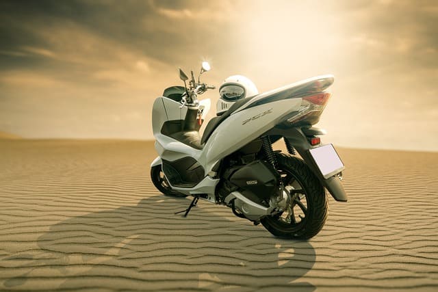 Featured image for "Your Complete Guide to Upgrading to Premium Synthetic Oil in the 2023 Suzuki* AN 400 Burgman* [FAQs Addressed]" blog post. Burgman motorcycle.