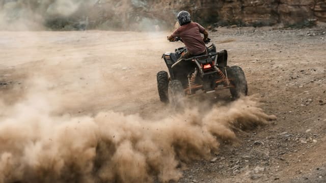 Featured image for "Maximizing Your 2023 Suzuki* KingQuad* 400's Performance: The Essential Guide to Selecting the Right Synthetic Oil" blog post. Suzuki ATV.