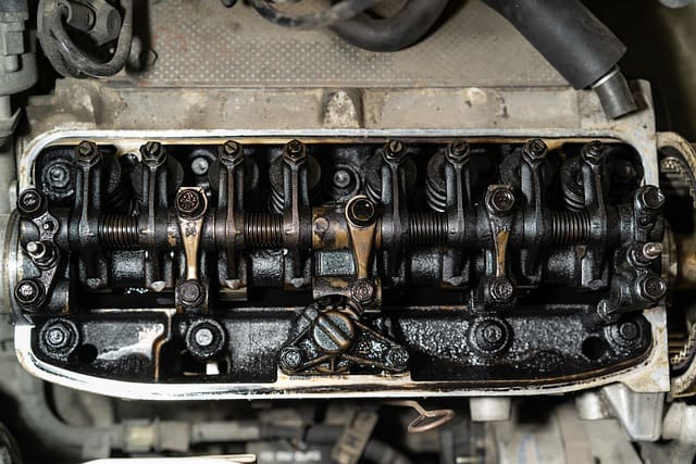 Featured image for "Engine Oil Sludge in High-Mileage Vehicles: Maintenance Tips" blog post. Cylinder head.