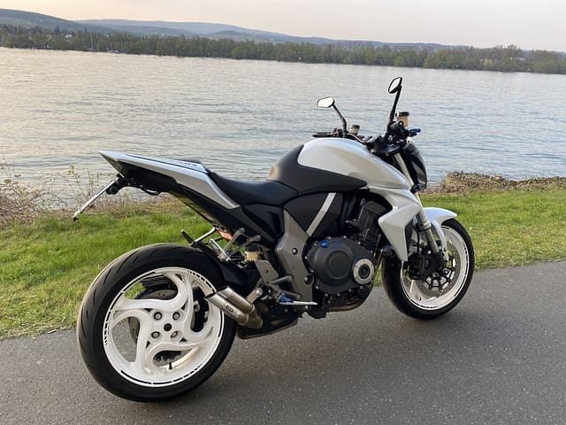 Featured image for "Don't Be a Synthetic Oil Slacker: Give Your 2023 Honda* CB 1000 R the Love It Deserves" blog post. Honda CB bike.