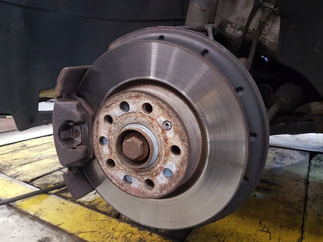 Featured image for "How to Diagnose and Fix Squealing Brakes" blog post. Car brake.